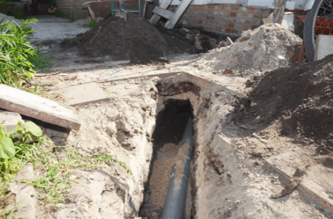 open sewer line in need of repair
